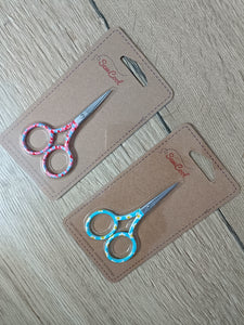 Coloured-handled scissors